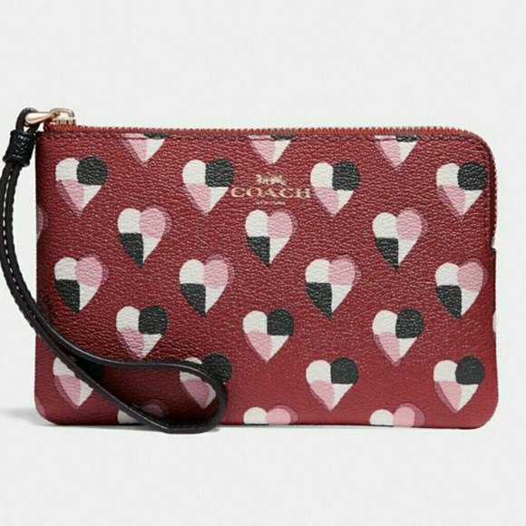 Coach Handbags - 💖 COACH CORNER ZIP WRISTLET/PHONE WALLET 💖